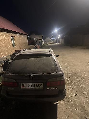 аудио касета: Mazda 626: 1997 г., 1.8 л, Механика, Бензин, Универсал — 3