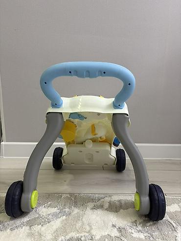 Детские ходунки: Развивающая каталка-ходунки для малышей - Устойчивая конструкция на 4 — 5