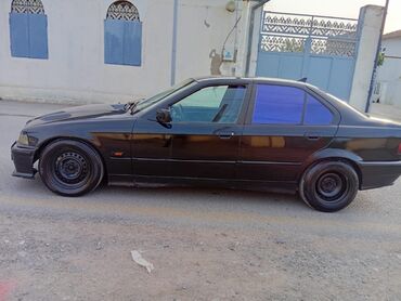 bmw maşın şəkilləri: BMW 320: 2 l | 1992 il Sedan