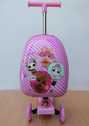 Trotineti, skejtbordovi i hoverbordovi: Dečiji trotinet sa integrisanim koferom u roze boji, idealan za — 1