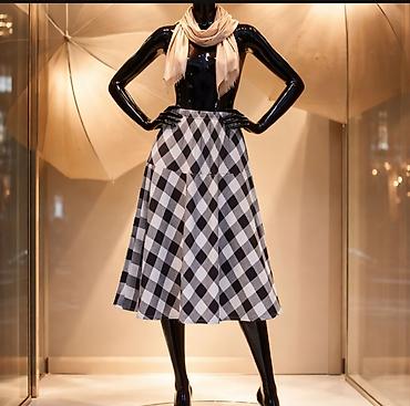 Suknje: Ženska midi suknja sa A-krojem i elastičnim pojasom - Dužina: midi — 1