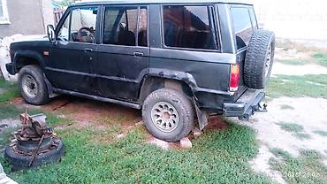 тунуке бу: Isuzu Trooper: 1991 г., 2.3 л, Кол менен иштөөчү, Дизель, Жол тандабас — 3