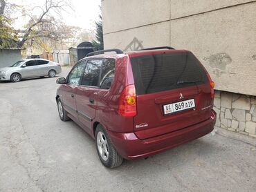 миссубици пожеро пинин: Mitsubishi Space Star: 2003 г., Механика, Универсал