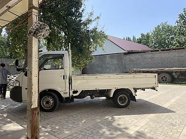 4 vd: Компактный бортовой малотоннажный грузовик Nissan (правый руль) — 8