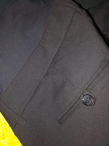 Pantalone: H&M trudnicke pantalone,crna boja.Sasvim nove.Velicina M — 9