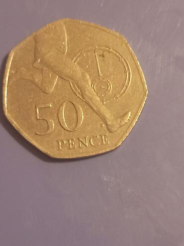 pa 50: Məhsul: Böyük Britaniya 50 pence xatirə sikkəsi Təsvir: - Nominal: 50 — 2