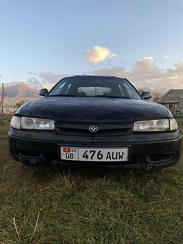 митсубиши спейс стар: Mazda Eunos 500: 1992 г., 2 л, Механика, Бензин, Седан — 1