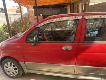 автокредит на бу авто бишкек: Красный компактный автомобиль Daewoo Matiz, предназначенный для