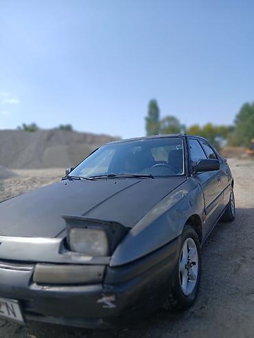 для такси авто: Mazda 323: 1991 г., 1.6 л, Механика, Бензин, Лифтбек — 2
