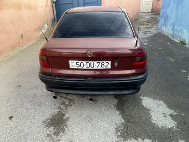 Opel: Opel Astra F sedan - Kuzov: 4 qapılı sedan, tünd qırmızı rəng - — 2