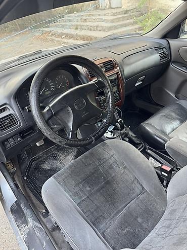 mazda старушка: Mazda 626: 1997 г., 1.8 л, Механика, Газ, Седан — 5