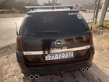 şevralit avtomobil: Opel Astra: 1.3 l | 2006 il Universal — 2