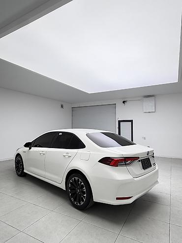 byd e1: Toyota Corolla: 2019 г., 1.8 л, Вариатор, Гибрид, Седан — 3