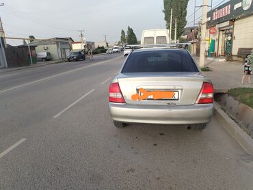 Mazda: Mazda 323: 1999 г., 1.6 л, Автомат, Бензин, Седан