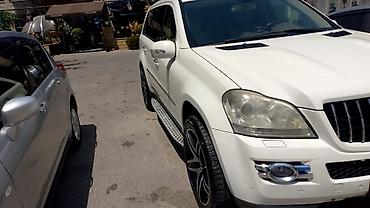 mersedes salon: Mercedes-Benz ML sinfi SUV Xüsusiyyətlər: - Kuzov: ağ rəng, 5 qapılı — 9