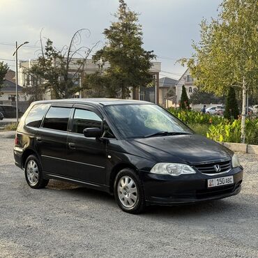 шыны на ниву: Honda Odyssey (3-е поколение, дорестайлинг), черный минивэн. Основные