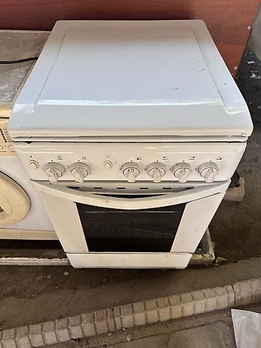 core 2: Газовая плита Indesit с духовкой - 4 газовые конфорки на варочной — 1