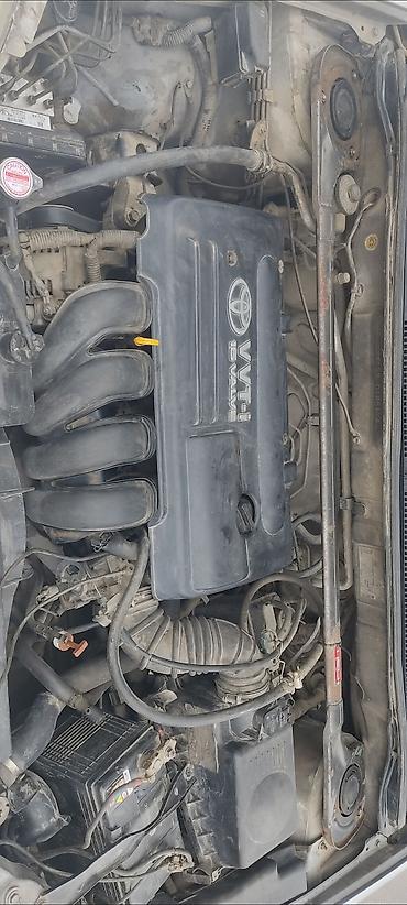 saturn sc: Toyota Corolla: 2003 г., 1.8 л, Автомат, Бензин, Универсал — 4