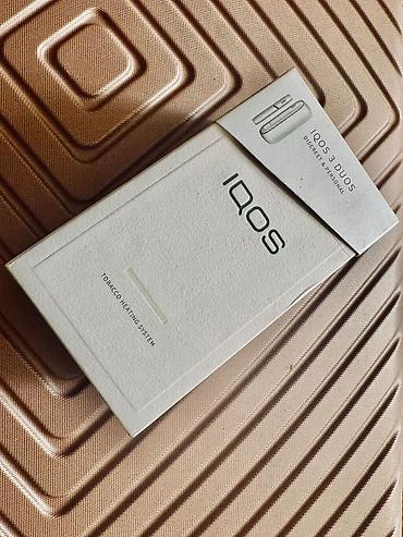 qəlyan icarə: İQOS 3 duos tütün qızdırıcısı. Glo tütün qızdırıcısı. Hər iki cihaz — 2