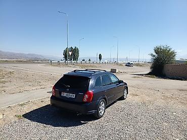 бишкек авто салон: Mazda 323: 2002 г., 2 л, Автомат, Бензин, Хетчбек — 5