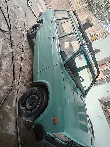 vaz oka satilir: VAZ 2104 universal kuzovlu minik avtomobil. Maşın açıq yaşıl rəngdədir — 1