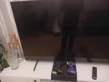 gigamax limitsiz internet: PlayStation 4 (PS4) oyun konsolu – 1 TB yaddaş icinde 15 ə yaxin oyun
