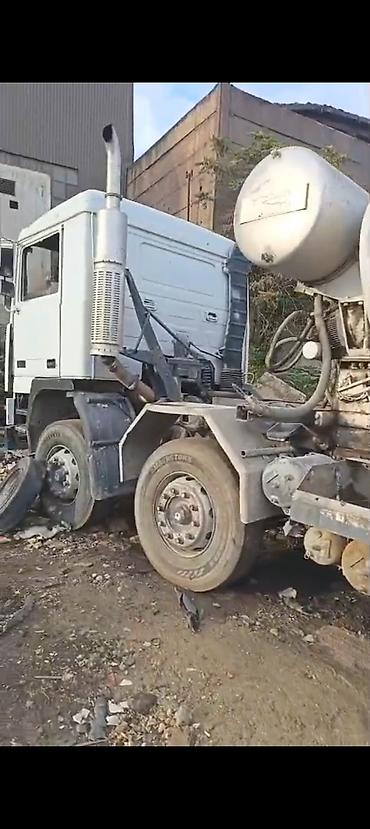 özüboşaldan yük maşınları: Ekskavator və betonqarışdıran yük maşını – tikinti və qazıntı işləri — 2