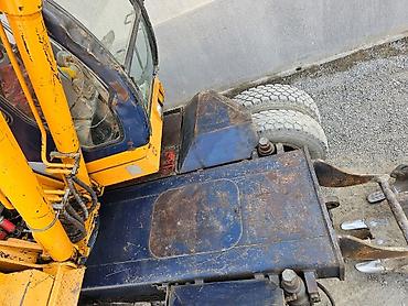 Экскаваторы: Экскаватор, Samsung, 1998 г., Колесный — 15