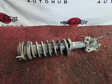 Амортизатор передний в сборе (стойка) для Mazda Demio DW3W, 2001 г.в.