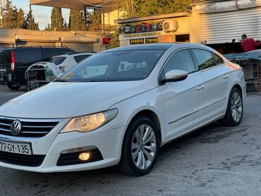 Volkswagen: Volkswagen Passat CC – ağ rəngli, zərif 4 qapılı kupe-sedan. Xarici — 21