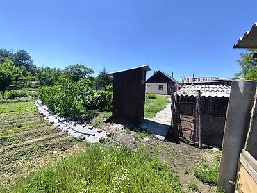 Продажа коттеджей и домов: Дом с участком. - Отдельный одноэтажный дом с двускатной крышей; — 11