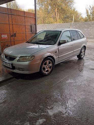 х5 м: Mazda Familia: 2001 г., Бензин, Универсал — 5