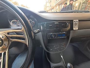 Chevrolet: Chevrolet Lacetti: 1.6 l | 2014 il 243433 km Sedan — 8