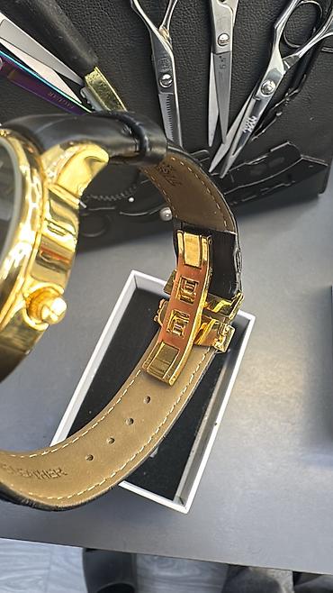 saat omega: Tissot kişi qol saatı – klassik dizayn - Korpus: Qızılı tonlu — 2