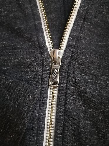 Dukserice: Nike ženska dukserica sa kapuljačom na rajsferšlus - Model: lagana — 2