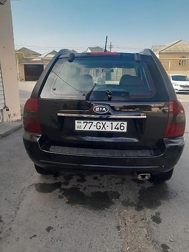 cherry masin: Kia Sportage – qara rəngli, şəhər və yolsuzluq üçün əlverişli kompakt — 8