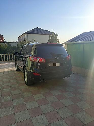 opel duman: Hyundai Santa Fe: 2 l | 2010 il Krossover — 8