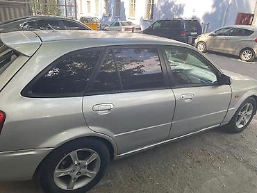 mazda 323 авто: Mazda Familia: 2003 г., Бензин, Универсал — 5