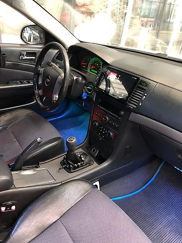 kia sorento oluxana: Chevrolet Epica sedan – ağ rəngdə, 5 yerlik, ön‑ötürücülü. Geniş salon — 2