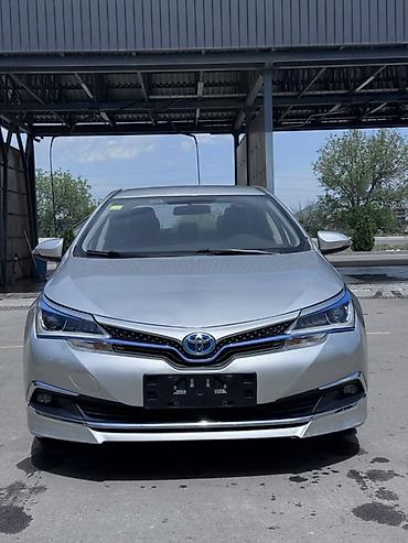 byd e1: Toyota Corolla: 2019 г., 1.8 л, Робот, Гибрид, Седан — 2