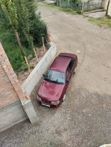 обмен на авто с доплатой: Автомобиль Daewoo Nexia, седан бордового цвета. Модель известна своей
