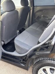 Kia: Kia Rio RS, qara rəng, hetçbek gövdə. Əsas xüsusiyyətlər: - 5 qapılı — 11