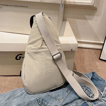 Другие сумки: Сумка-слинг через плечо, светло-бежевый цвет. - Формат — 4