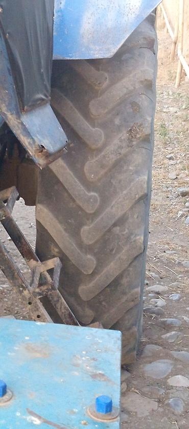 Traktorlar: Mavi rəngli təkərli kənd təsərrüfatı traktoru Texniki xüsusiyyət və — 9