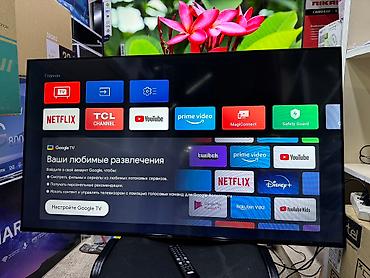 Телевизоры: Телевизор TCL 50V6B, LED, черный Описание Используйте голос для — 2