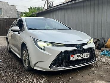 шильдик гибрид: Toyota Levin: 2020 г., 1.8 л, Вариатор, Гибрид, Седан — 1