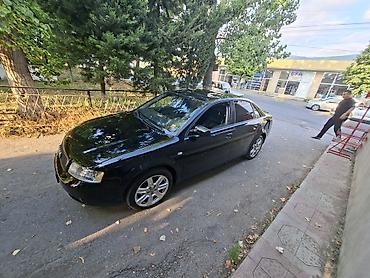 фольксваген пассат 1: Audi A4: 1.8 л | 2003 г. Седан — 6
