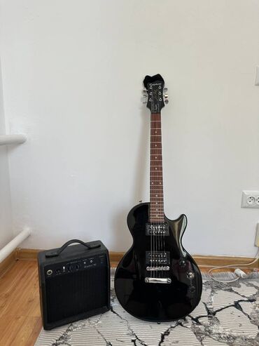 струны для гитары бишкек цена: Гитарный комплект Epihone Les Paul Player Pack 230V Ebony Абсолютно
