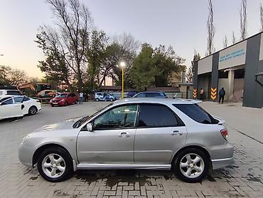 машины субару: Subaru Impreza: 2006 г., 1.5 л, Автомат, Бензин, Универсал — 7