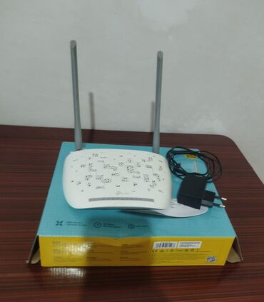 Modemlər və şəbəkə avadanlıqları: TP-LİNK modem, az işlənib Qutu daxilində:Adapter+LAN kabel+qoşulma